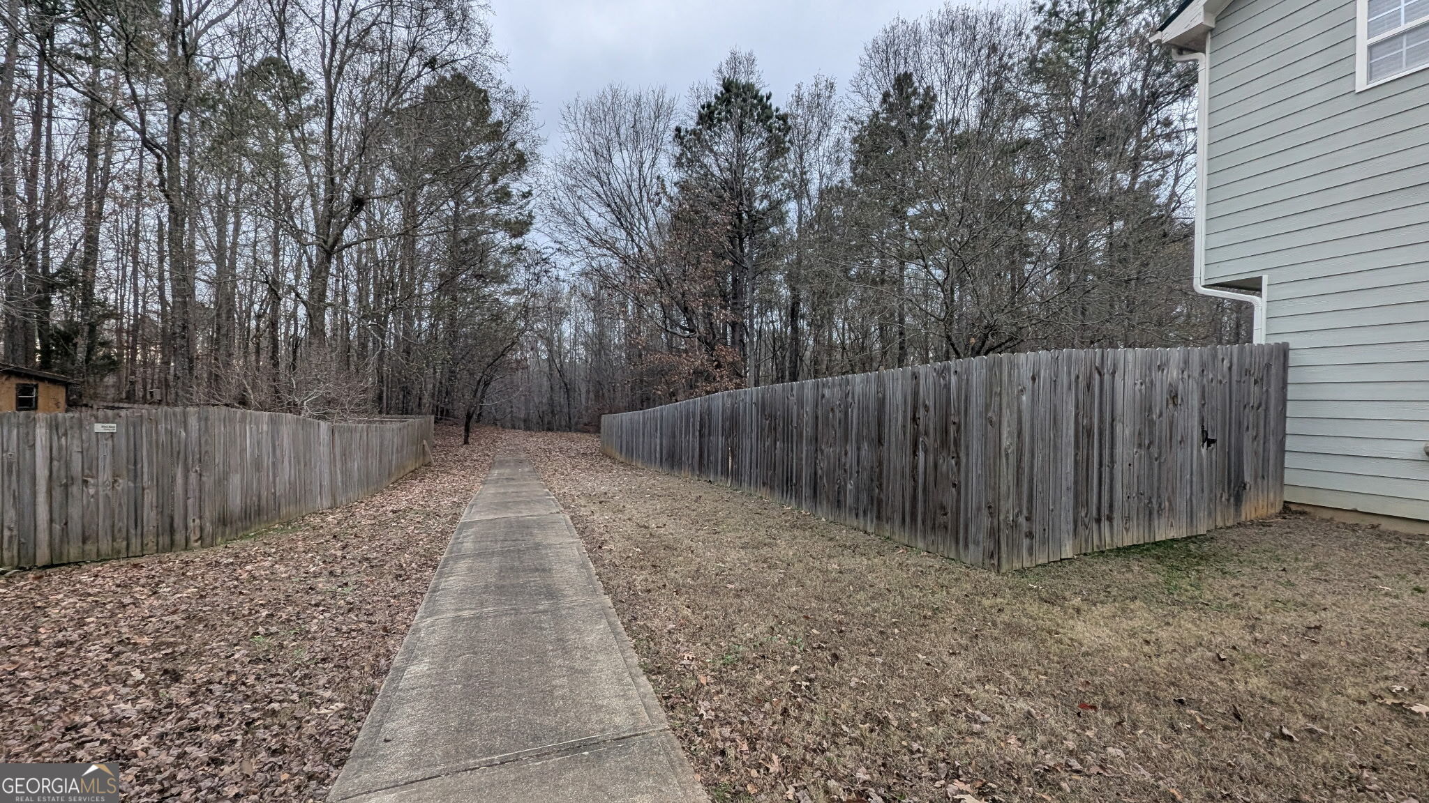 48 Highlander Trail Southwest Rome, GA 30165 - Photo 4 of 45 a view of backyard with wooden fence