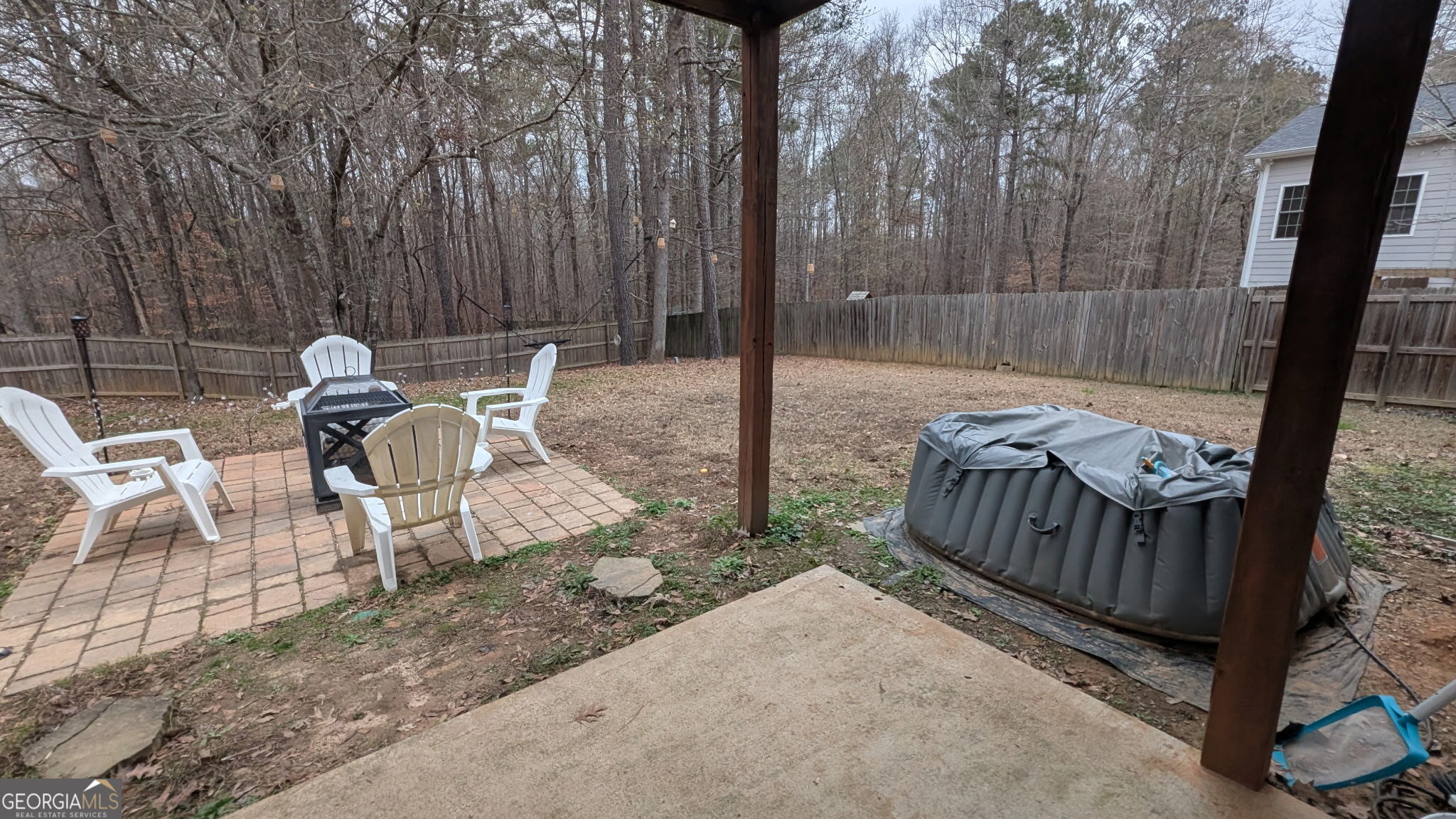 48 Highlander Trail Southwest Rome, GA 30165 - Photo 42 of 45 a view of a patio with two chairs and a table
