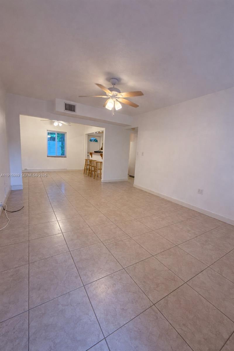 6141 Southwest 47th Street, Unit 1 Miami, FL 33155 - Photo 3 of 11 a view of workspace with window