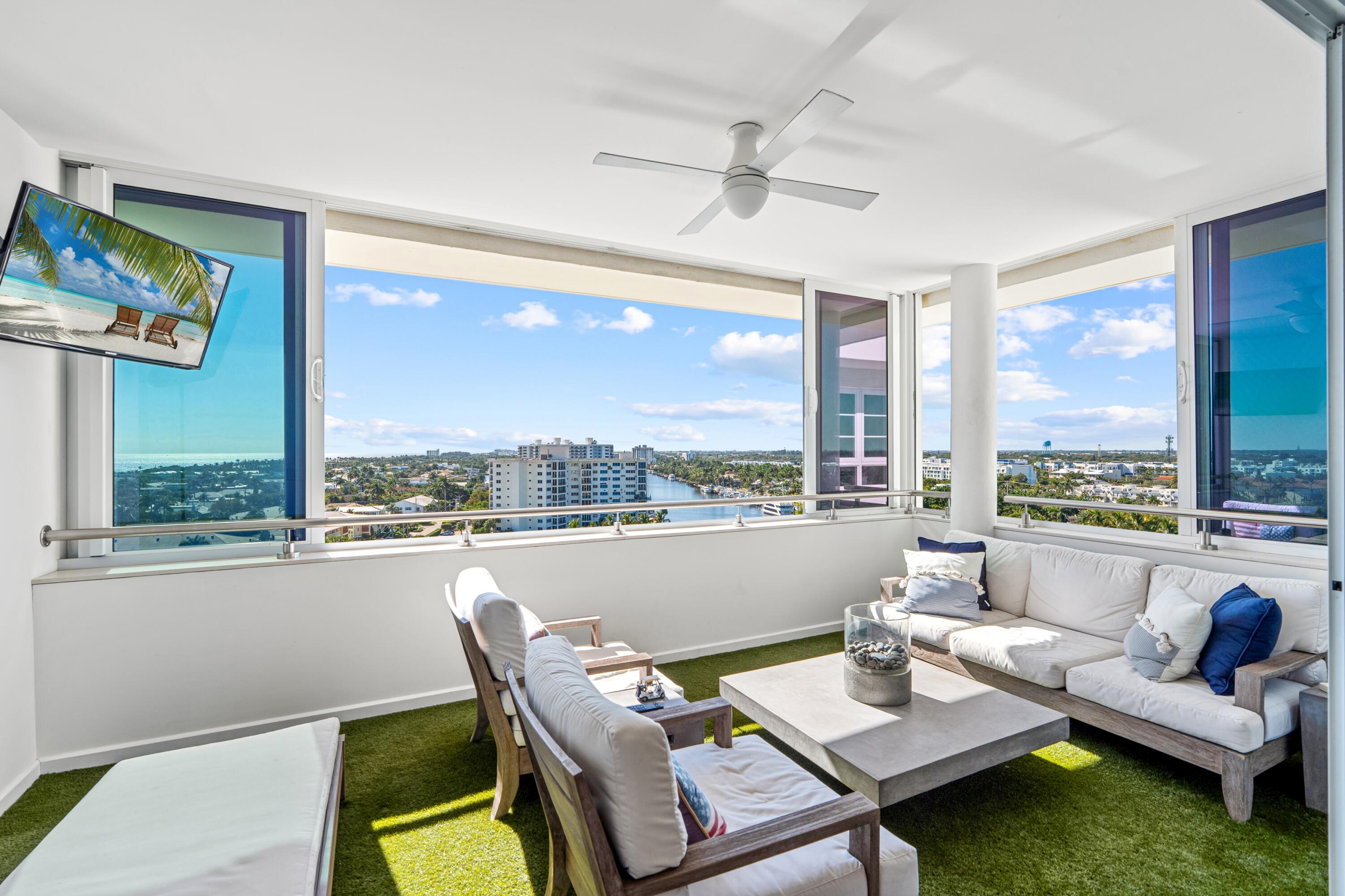 50 E Road, Unit 12G (PENTHOUSE) Delray Beach, FL 33483 - Photo 32 of 75 a living room with furniture and a window