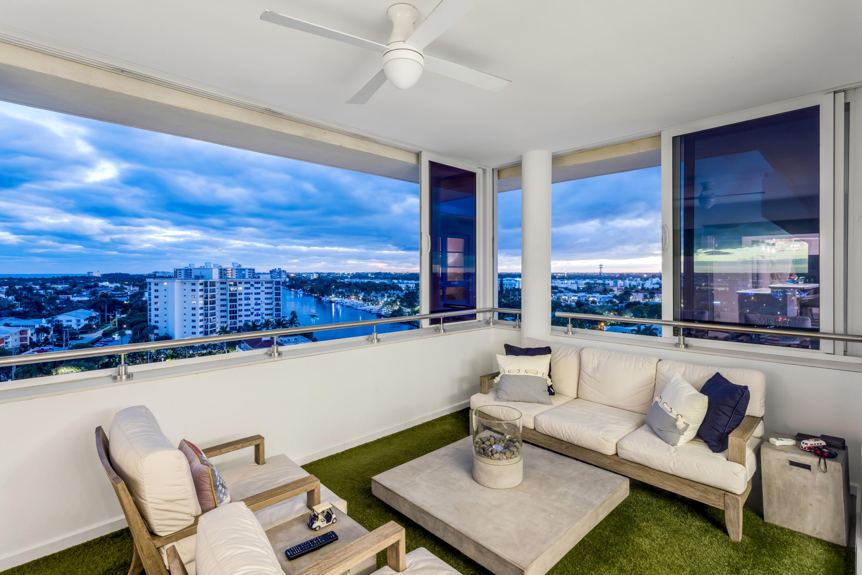 50 E Road, Unit 12G (PENTHOUSE) Delray Beach, FL 33483 - Photo 33 of 75 a living room with furniture and a large window