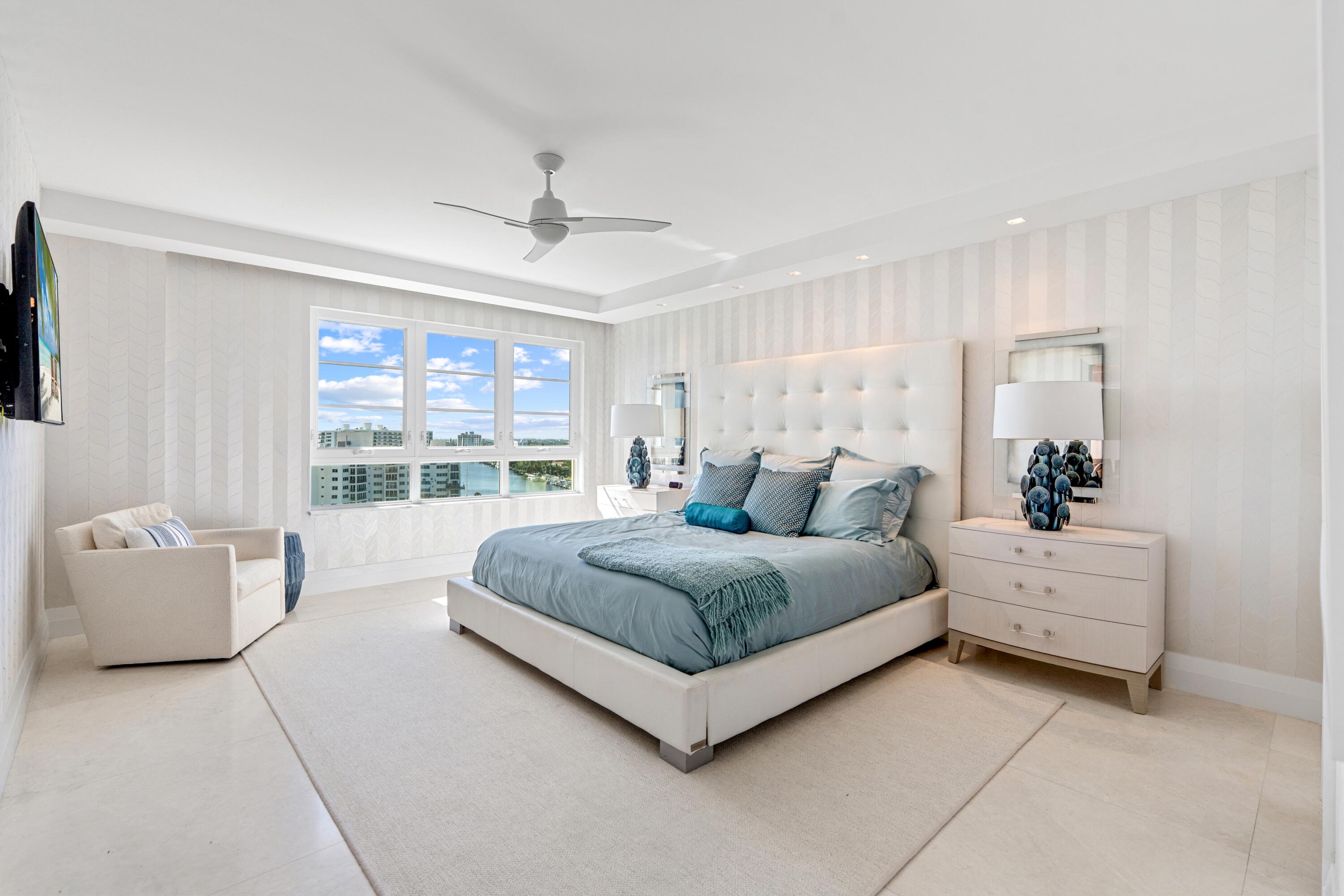 50 E Road, Unit 12G (PENTHOUSE) Delray Beach, FL 33483 - Photo 52 of 75 a spacious bedroom with a large bed and a window