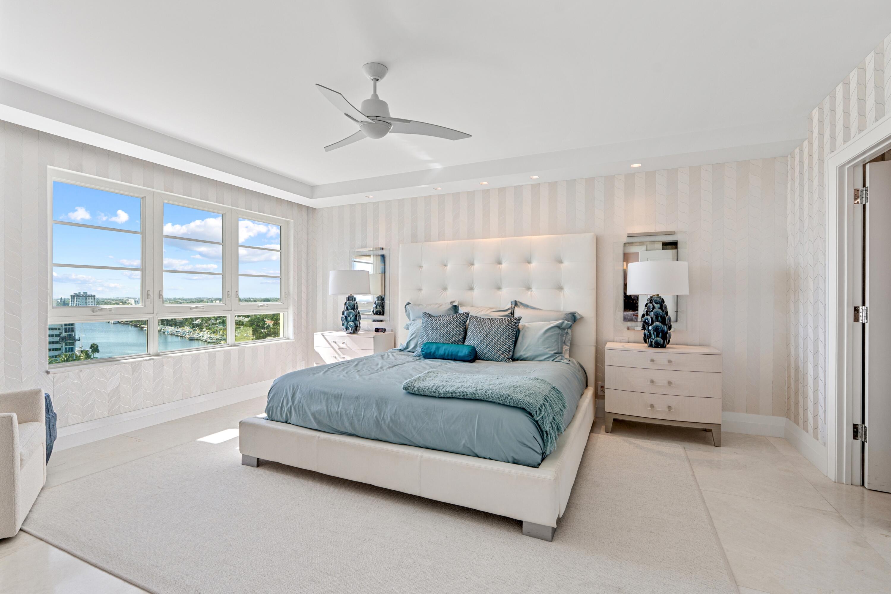 50 E Road, Unit 12G (PENTHOUSE) Delray Beach, FL 33483 - Photo 53 of 75 a spacious bedroom with a bed and a large window