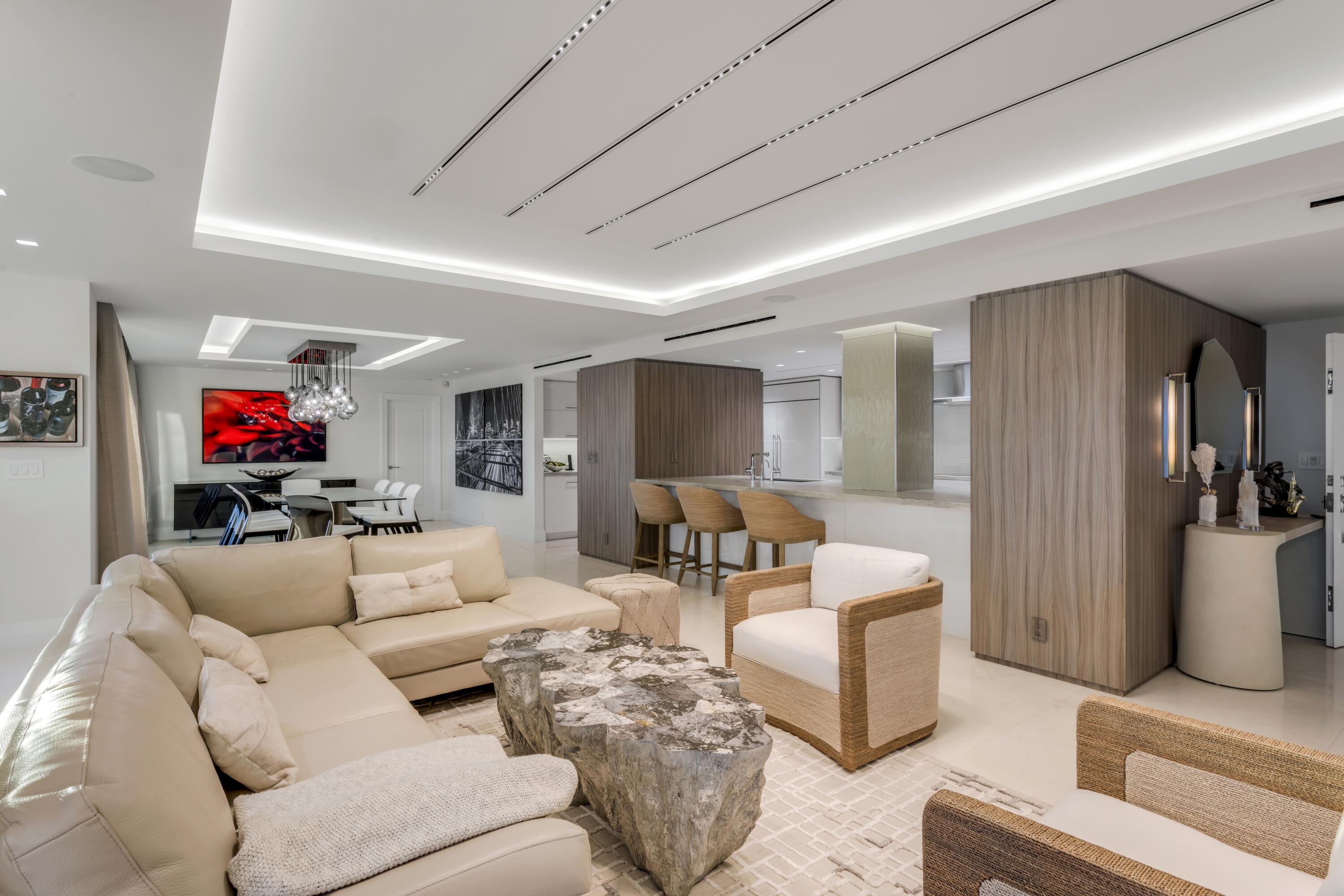 50 E Road, Unit 12G (PENTHOUSE) Delray Beach, FL 33483 - Photo 10 of 75 a living room with furniture and a wooden floor