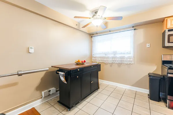 a kitchen with a cabinets and window