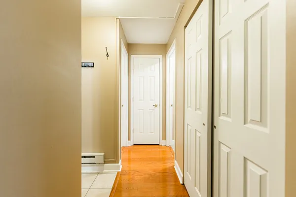 a view of a bathroom with a tub and shower