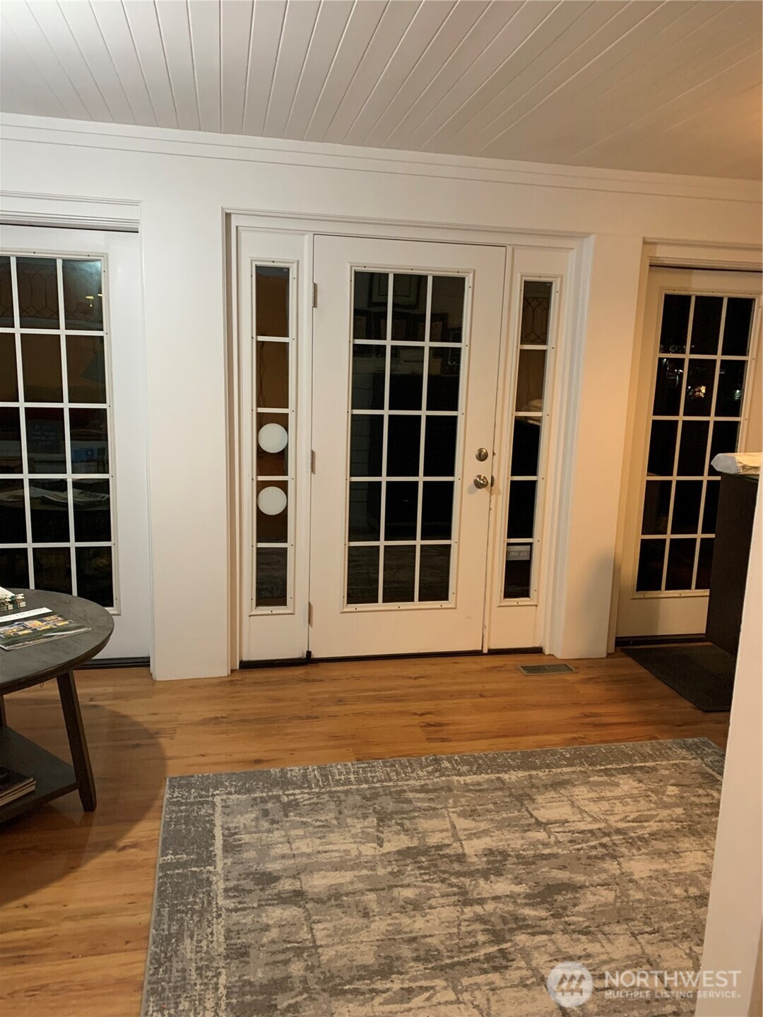 465 Tyee Drive Point Roberts, WA 98281 - Photo 17 of 19 a view of front door with wooden floor and windows