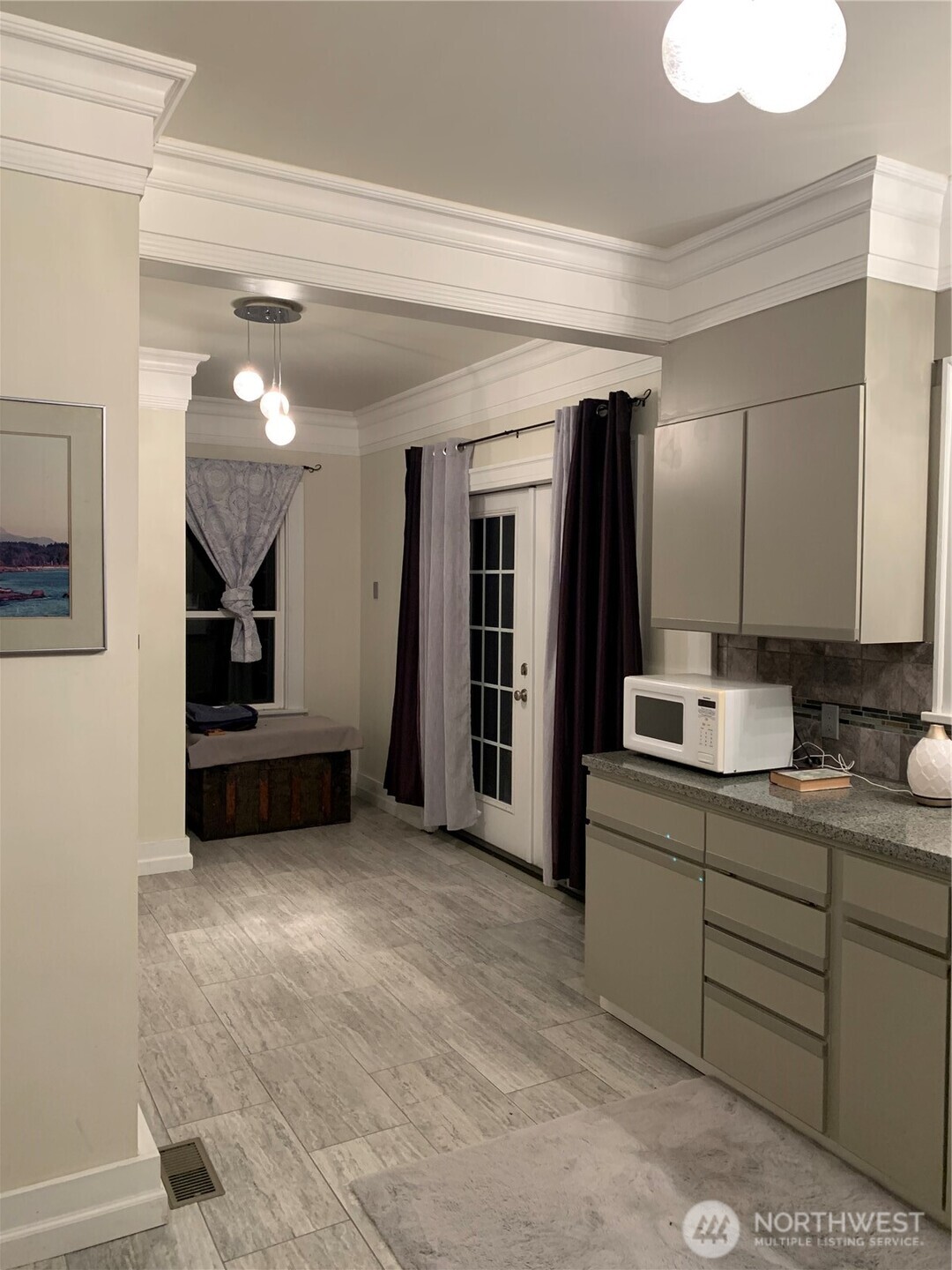 465 Tyee Drive Point Roberts, WA 98281 - Photo 4 of 19 a bathroom with a sink a mirror and a shower