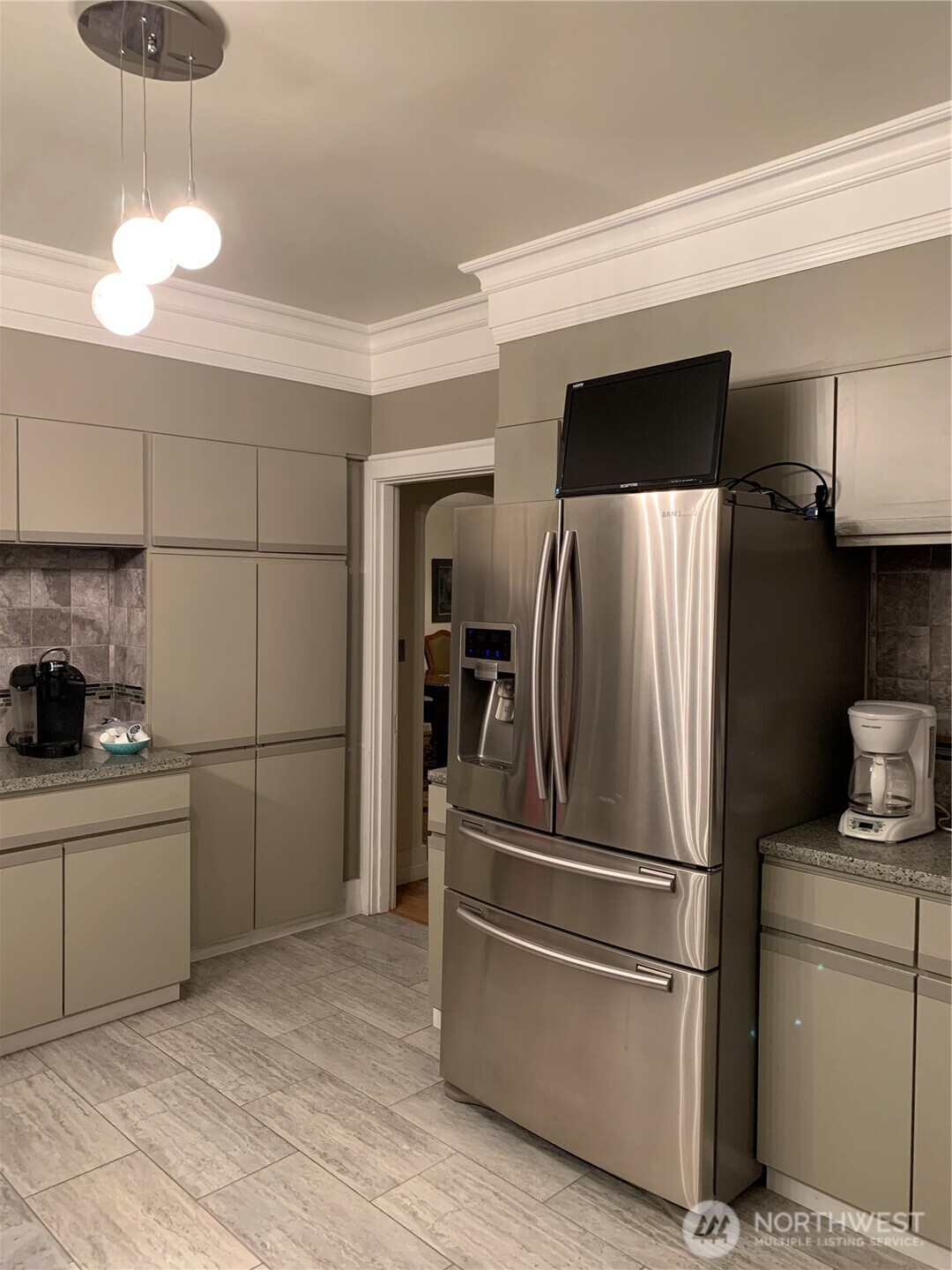 465 Tyee Drive Point Roberts, WA 98281 - Photo 5 of 19 a metallic refrigerator freezer sitting in a kitchen