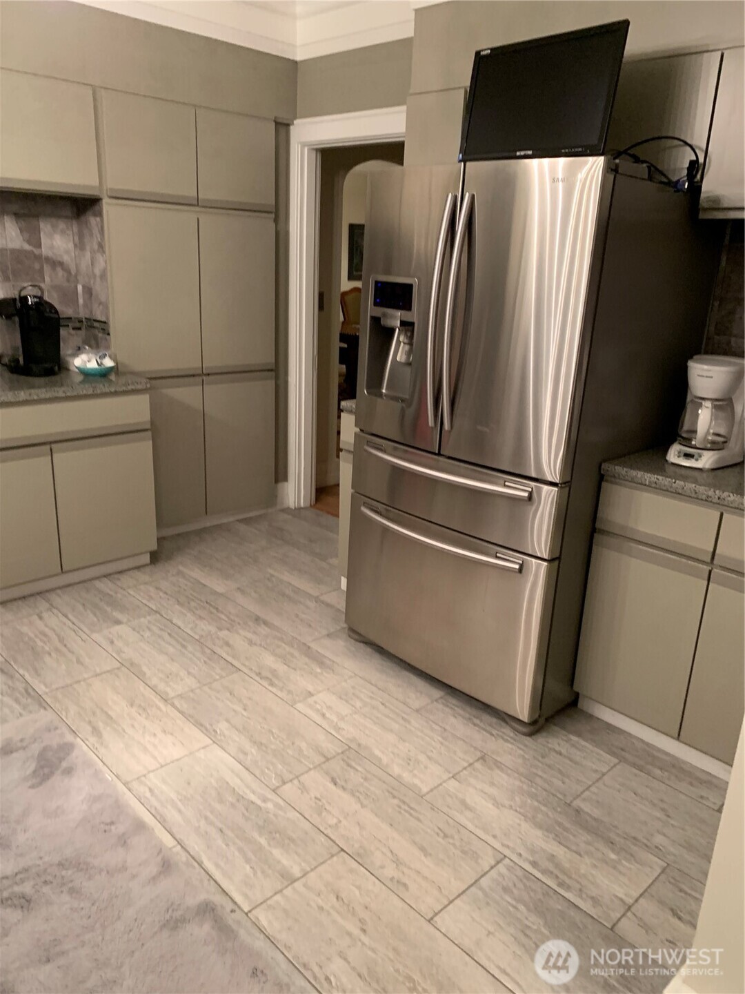 465 Tyee Drive Point Roberts, WA 98281 - Photo 6 of 19 a kitchen with stainless steel appliances a refrigerator sink and cabinets