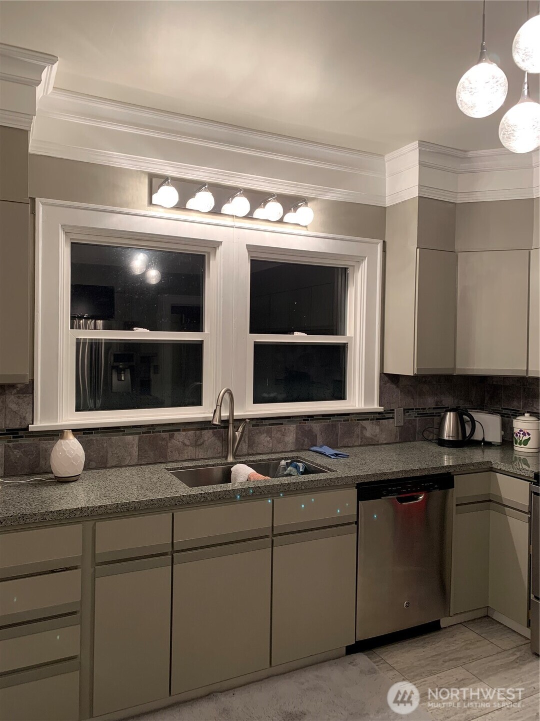 465 Tyee Drive Point Roberts, WA 98281 - Photo 7 of 19 a bathroom with a sink and a mirror