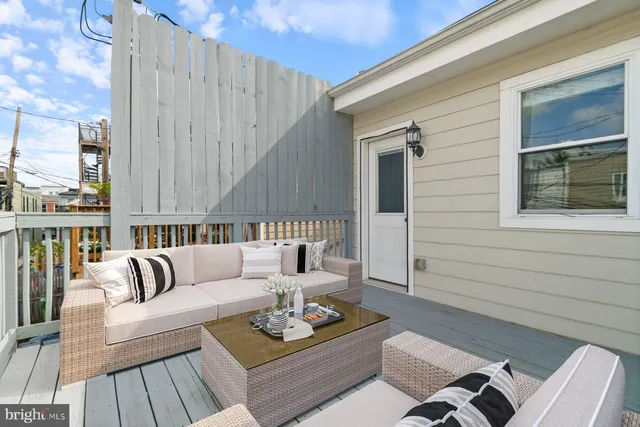 a building outdoor space with patio furniture