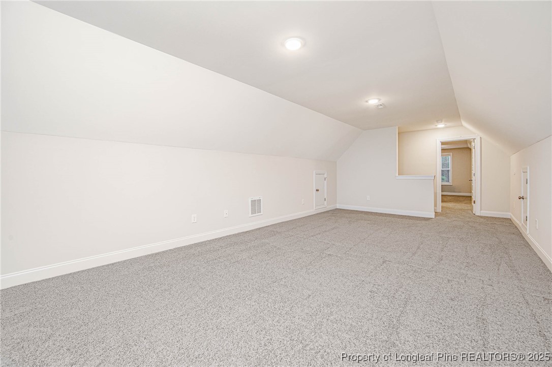 1105 Wolf Pne Court Fayetteville, NC 28311 - Photo 28 of 36 an empty room with an entryway