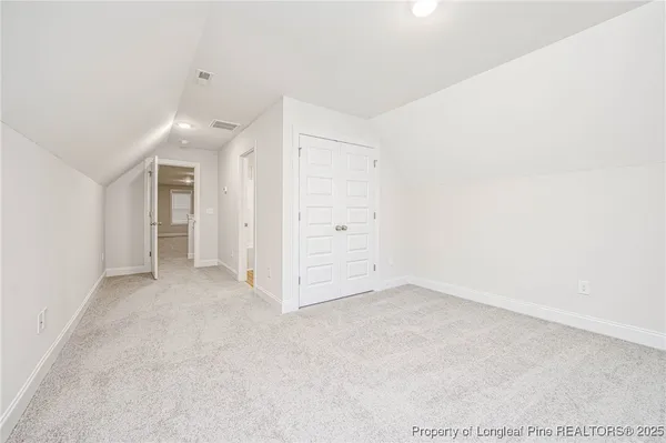 a bathroom with a toilet a sink and bathtub
