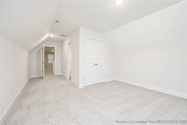 a bathroom with a toilet a sink and bathtub