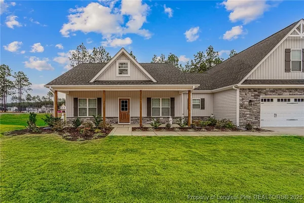 a front view of a house with patio
