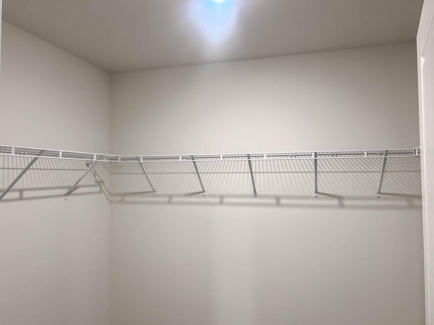 7136 Fair Oaks Road Mount Pleasant, WI 53403 - Photo 6 of 26 Primary walk in closet