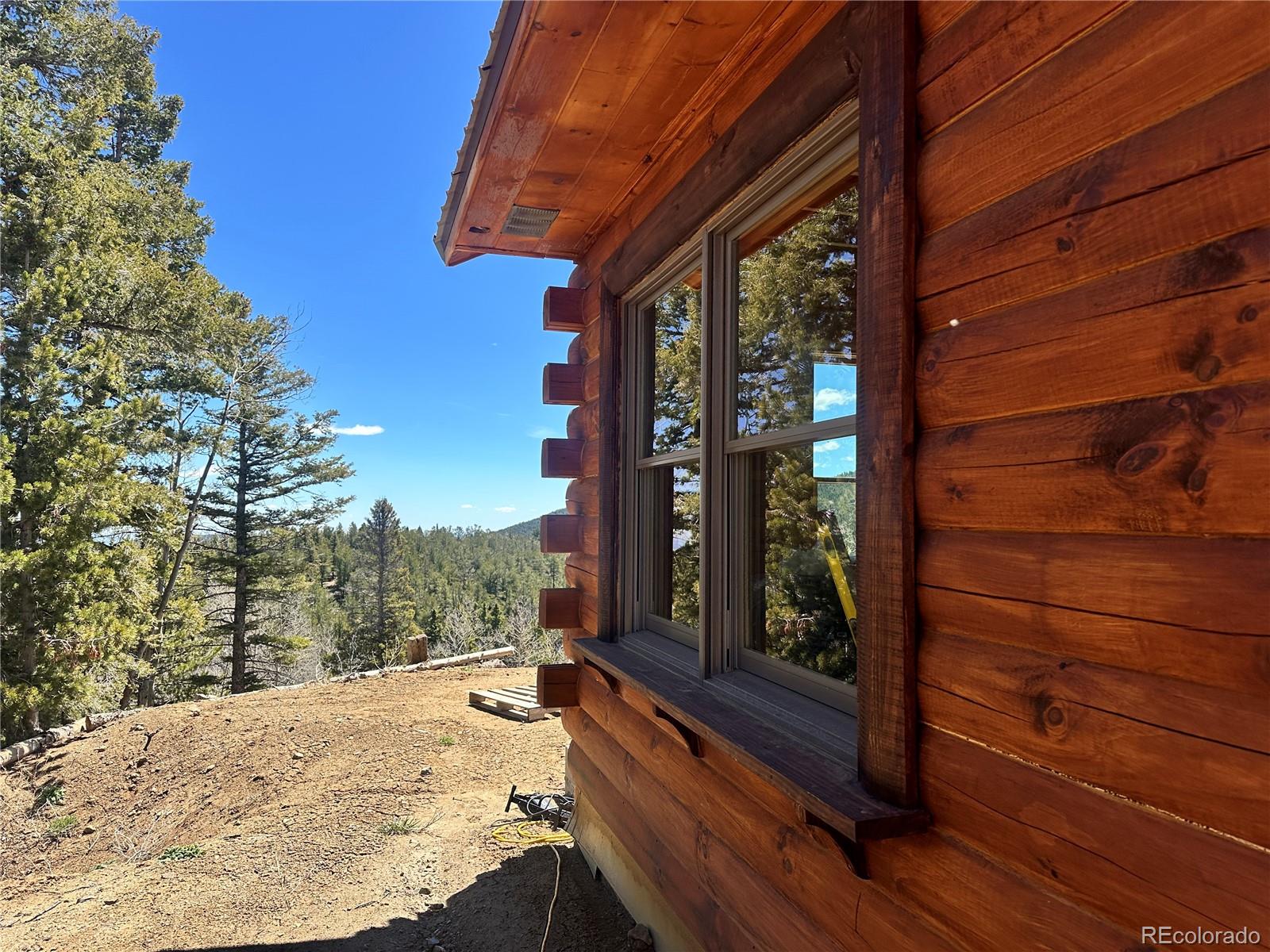 3425 Co Road Westcliffe, CO 81252 - Photo 6 of 15 a view of a balcony with a tree