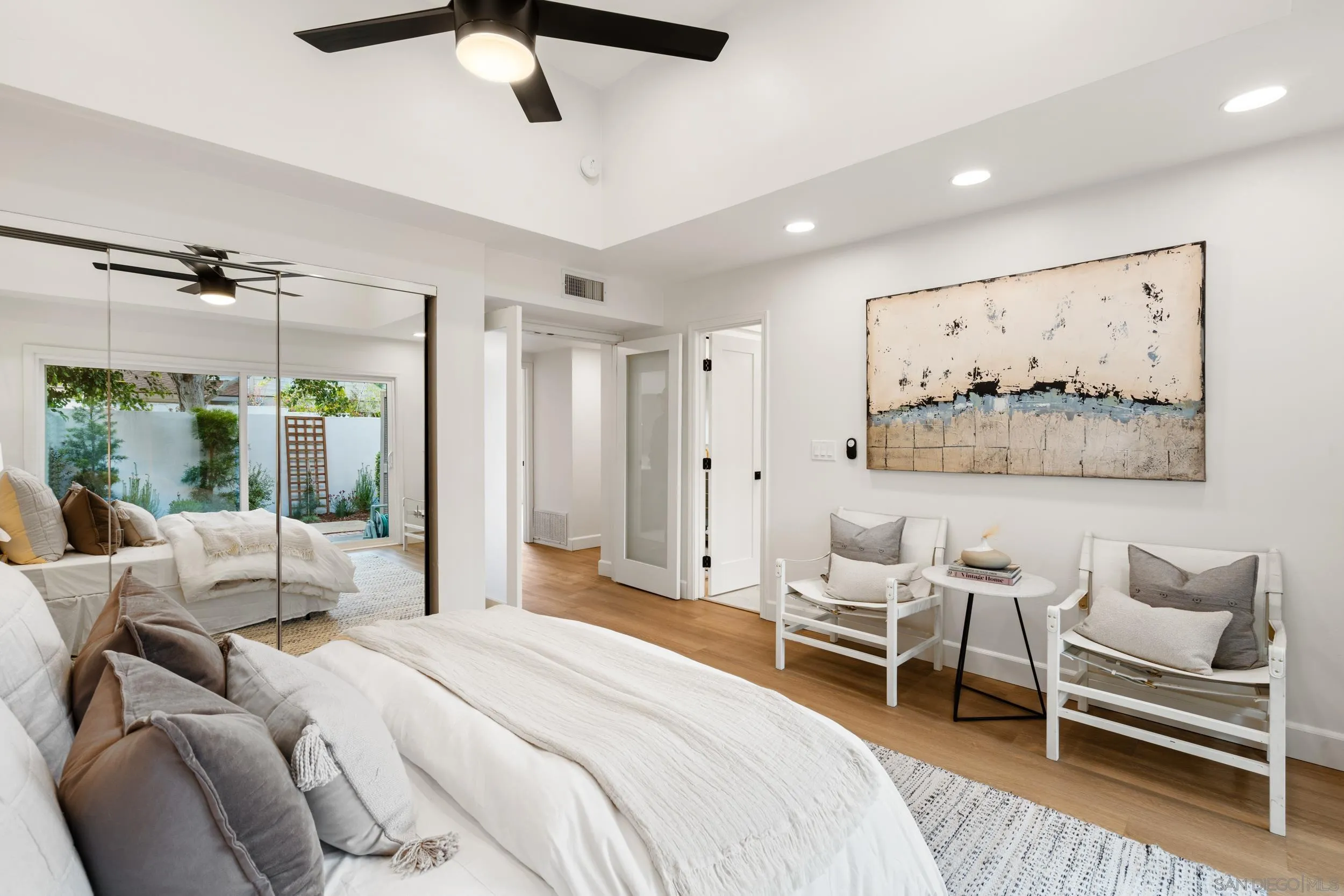 103 Cancha De Golf Rancho Santa Fe, CA 92091 - Photo 15 of 32 a bedroom with a bed furniture and painting on the wall