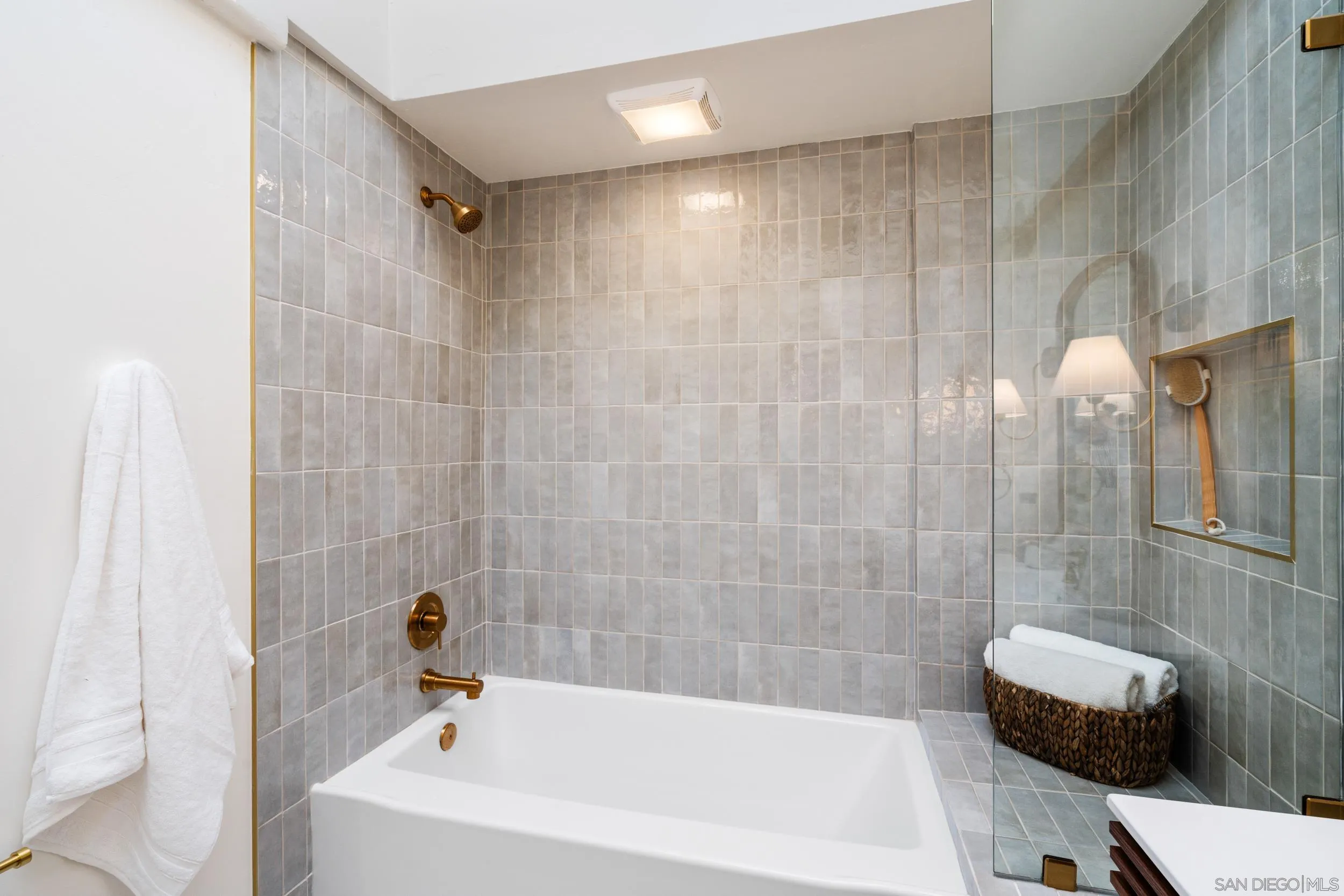 103 Cancha De Golf Rancho Santa Fe, CA 92091 - Photo 22 of 32 a bathroom with a bathtub and a shower