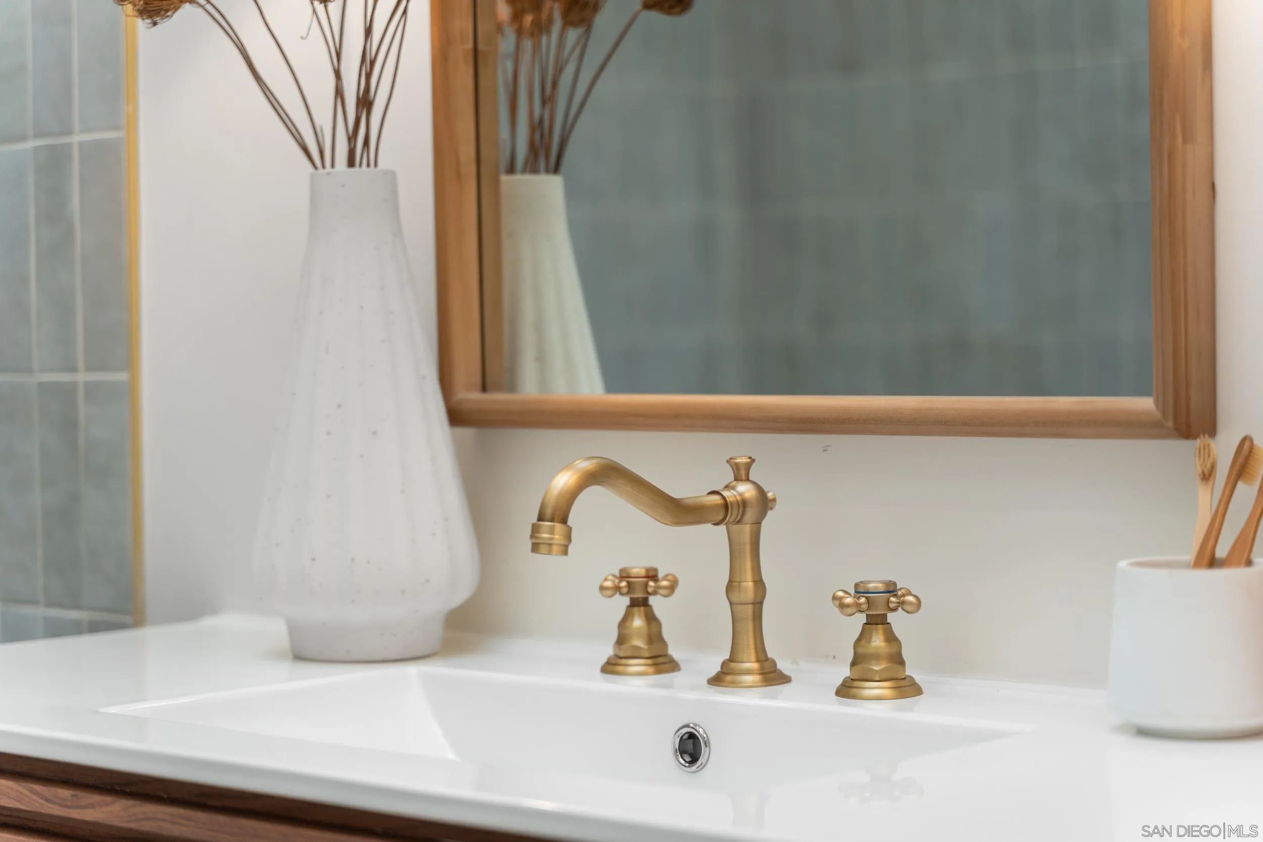 103 Cancha De Golf Rancho Santa Fe, CA 92091 - Photo 23 of 32 a bathroom with a sink and a window