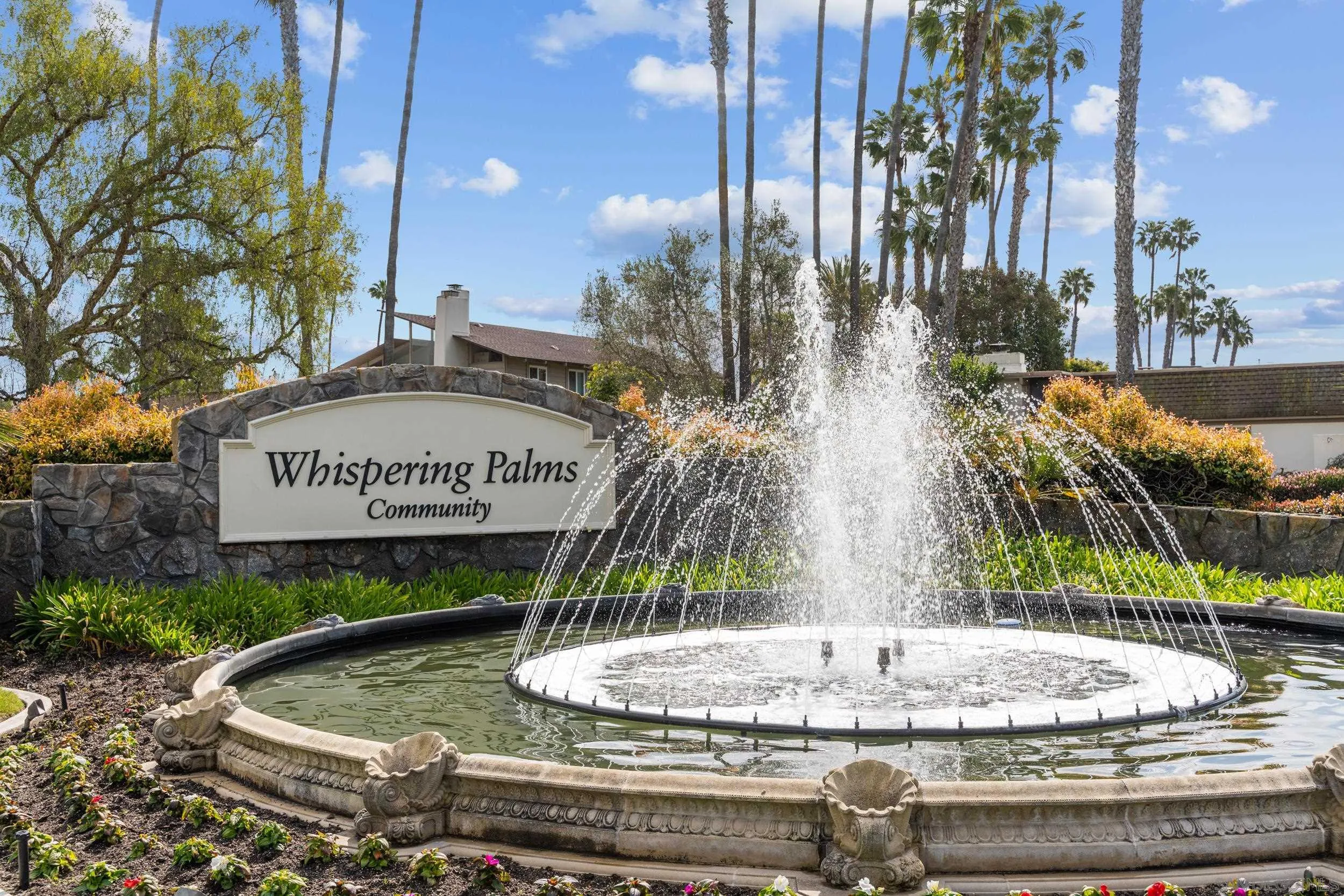 103 Cancha De Golf Rancho Santa Fe, CA 92091 - Photo 26 of 32 a view of a fountain with tree in the background