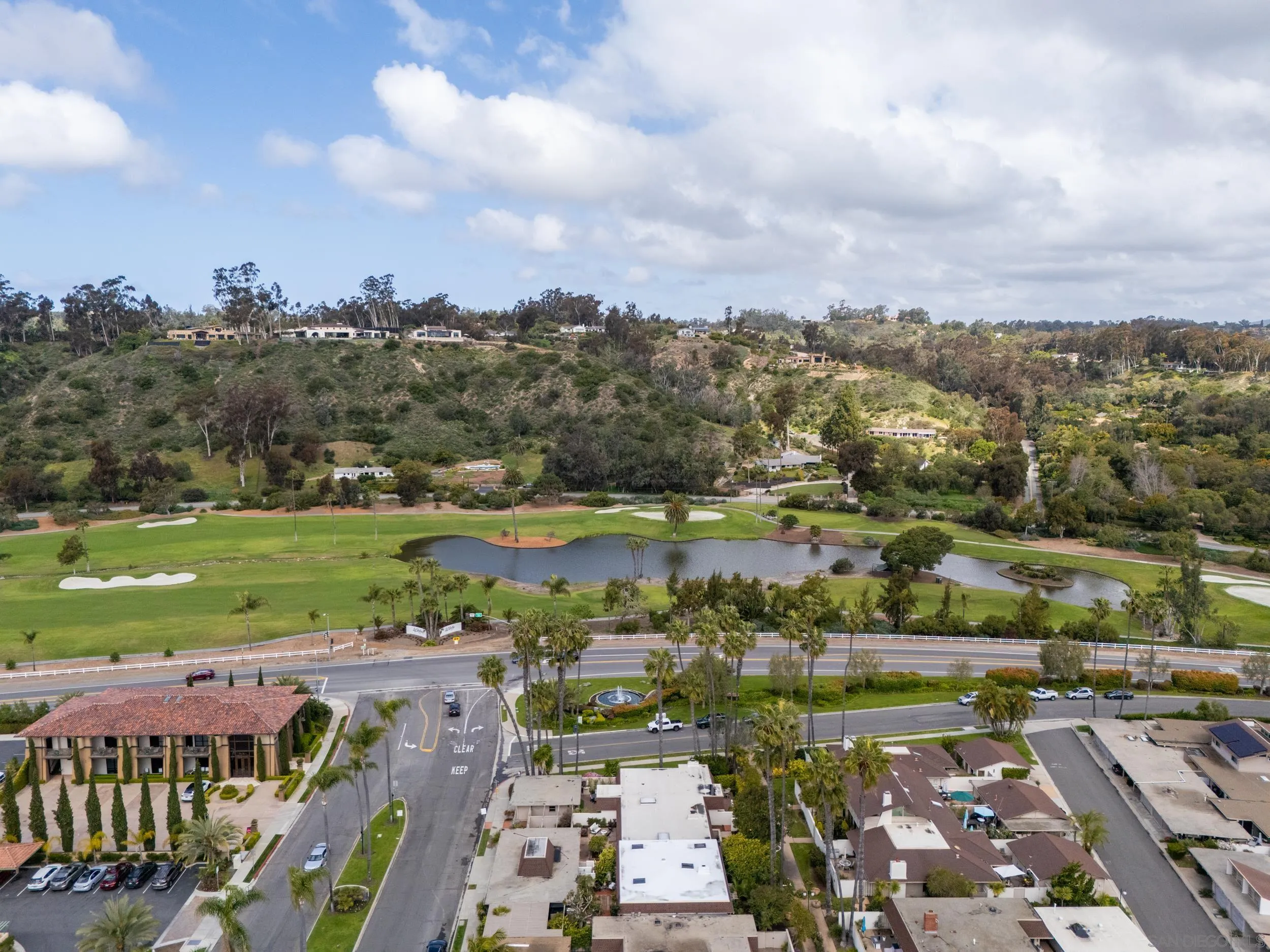 103 Cancha De Golf Rancho Santa Fe, CA 92091 - Photo 30 of 32 an aerial view of a city with lots of residential buildings and lake view