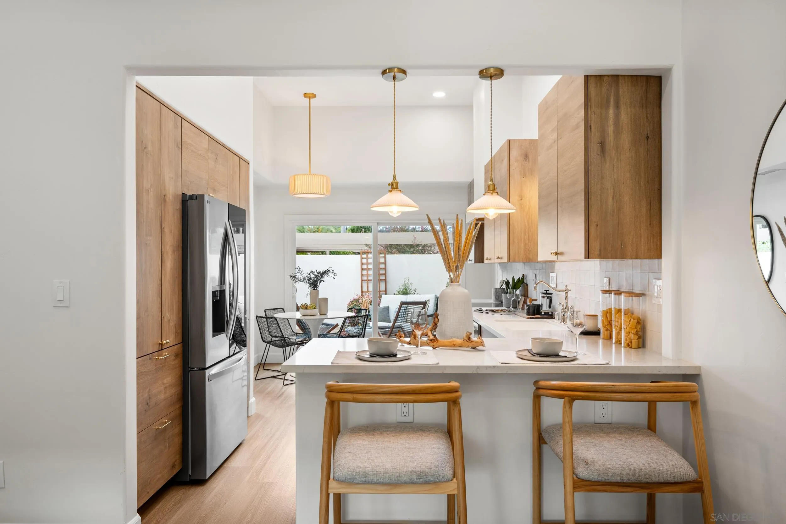 103 Cancha De Golf Rancho Santa Fe, CA 92091 - Photo 7 of 32 a kitchen with a sink cabinets and appliances