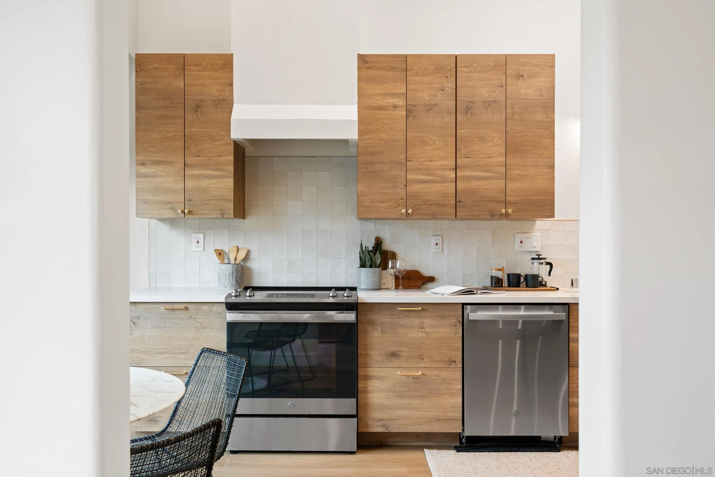 103 Cancha De Golf Rancho Santa Fe, CA 92091 - Photo 8 of 32 a kitchen with a cabinets and a sink