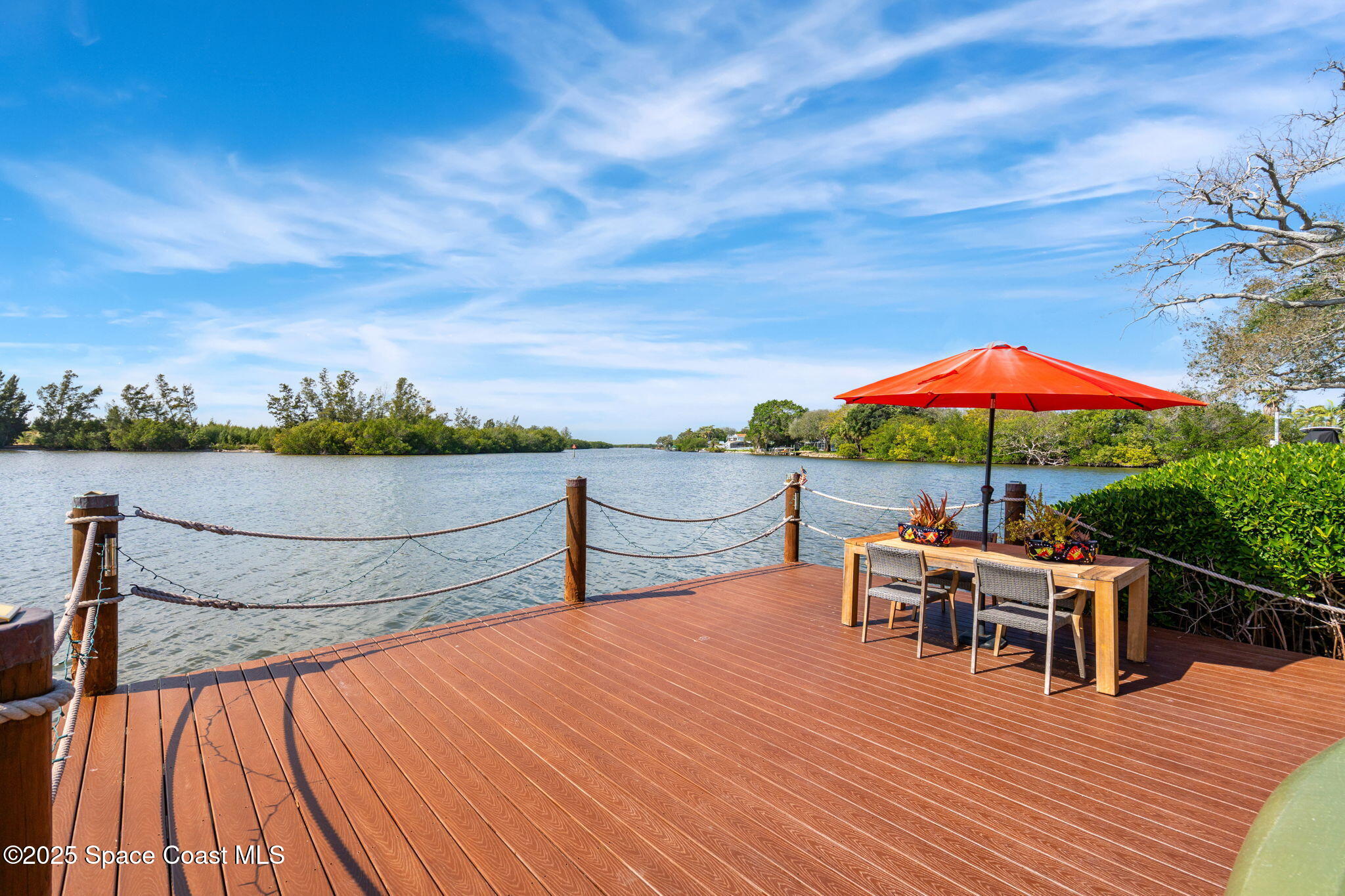 561 Capri Road Cocoa Beach, FL 32931 - Photo 66 of 82 a view of a terrace with furniture