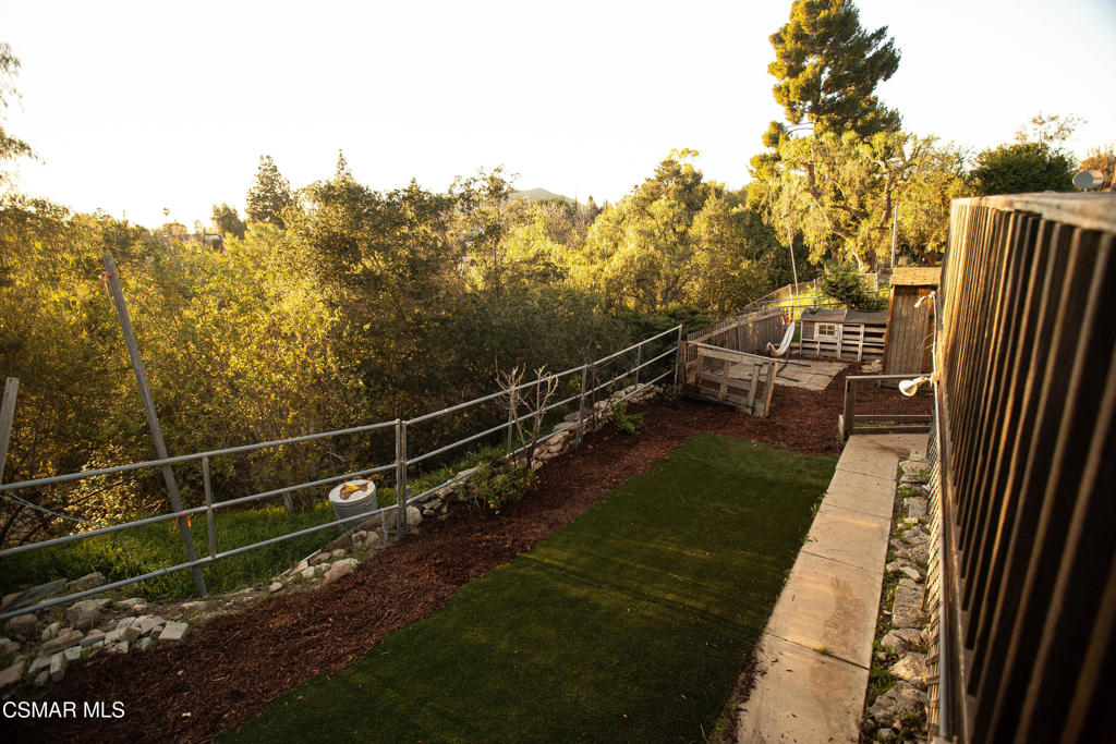 683 Languid Lane Simi Valley, CA 93065 - Photo 19 of 27 a view of a yard with potted plants