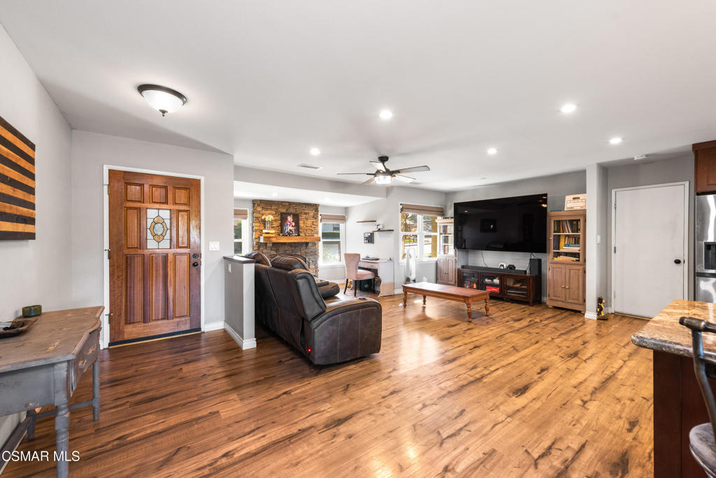 683 Languid Lane Simi Valley, CA 93065 - Photo 4 of 27 a living room with furniture and a flat screen tv