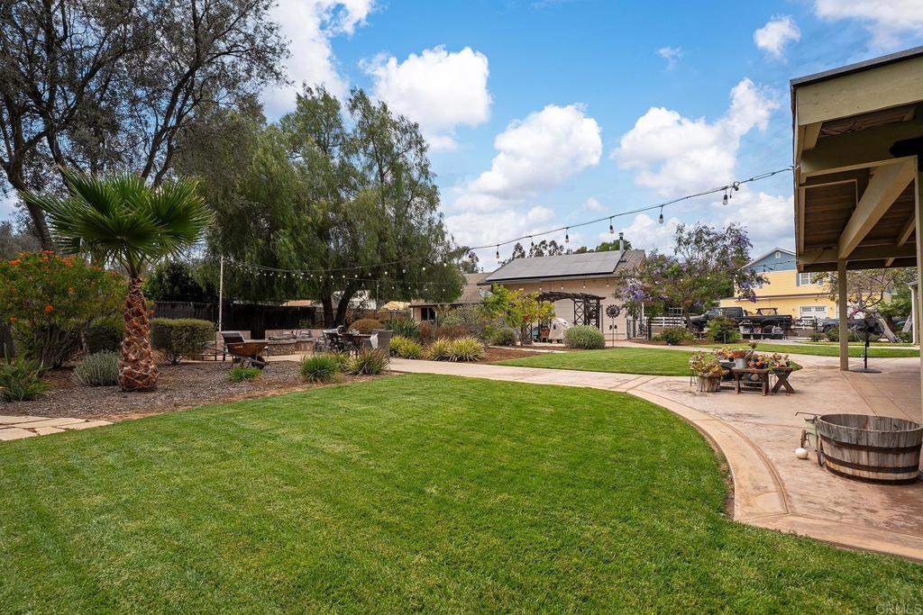 2430 Geyer Lane Alpine, CA 91901 - Photo 31 of 60 a view of a swimming pool with a patio and a yard