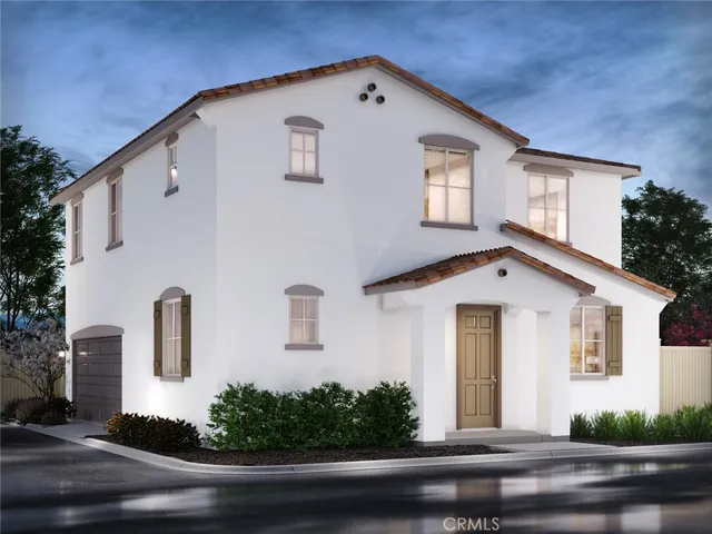 a front view of a house with garage
