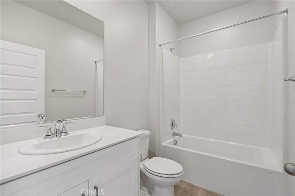 1110 Tropic Court Redlands, CA 92374 - Photo 17 of 44 a bathroom with a sink toilet and shower