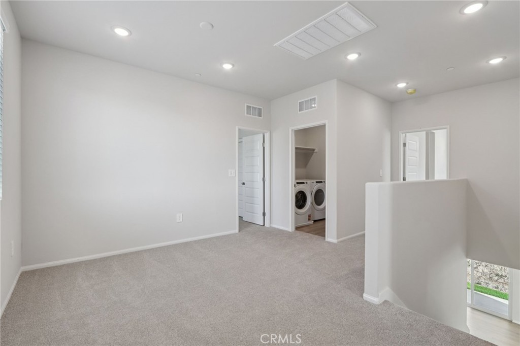 1110 Tropic Court Redlands, CA 92374 - Photo 20 of 44 a view of an empty room and a kitchen