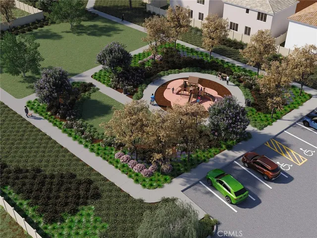 an aerial view of a house with a yard and lake view