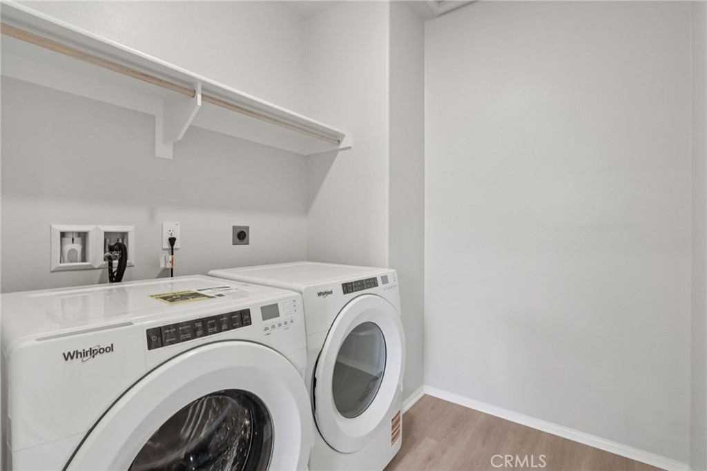 1110 Tropic Court Redlands, CA 92374 - Photo 25 of 44 a utility room with dryer and washer