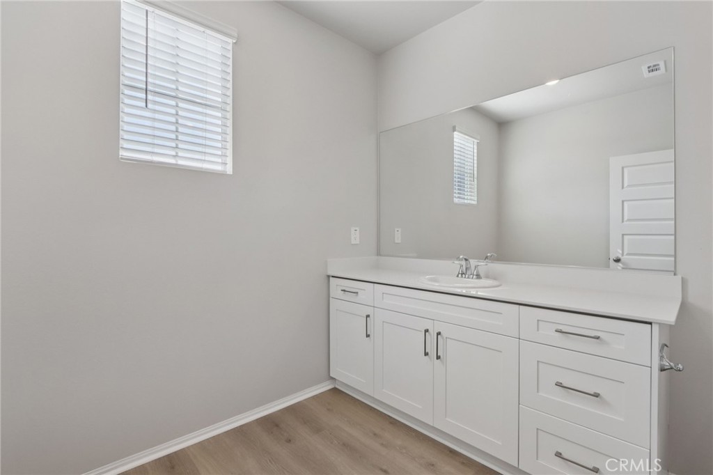 1110 Tropic Court Redlands, CA 92374 - Photo 28 of 44 a bathroom with a sink and a mirror