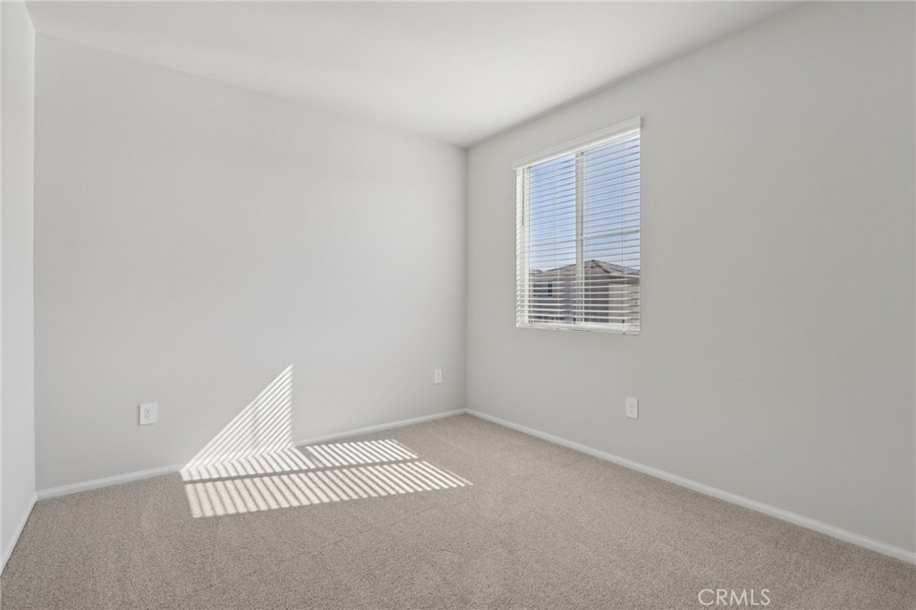 1110 Tropic Court Redlands, CA 92374 - Photo 29 of 44 a view of an empty room with a window