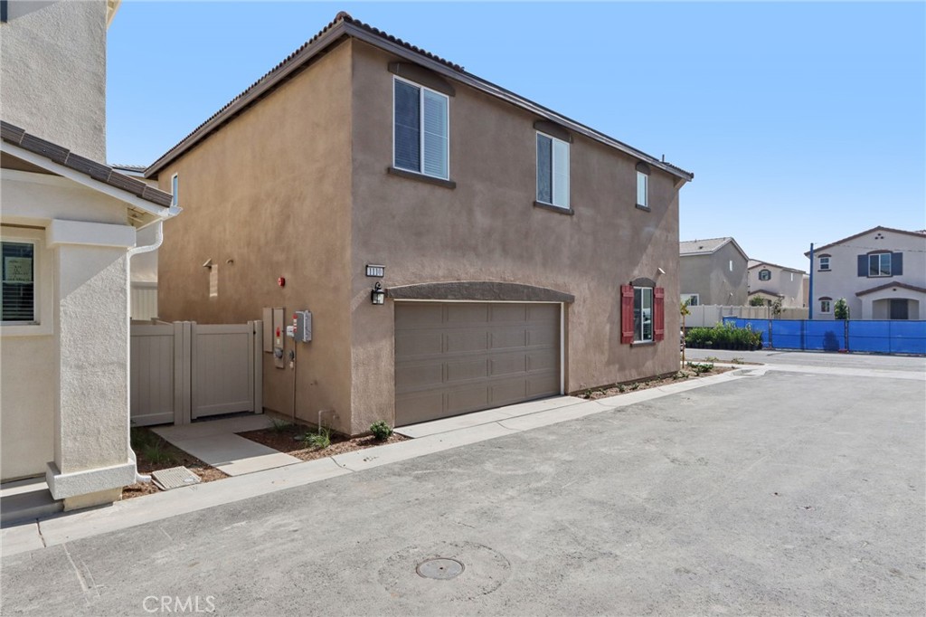 1110 Tropic Court Redlands, CA 92374 - Photo 40 of 44 a view of a house with a garage