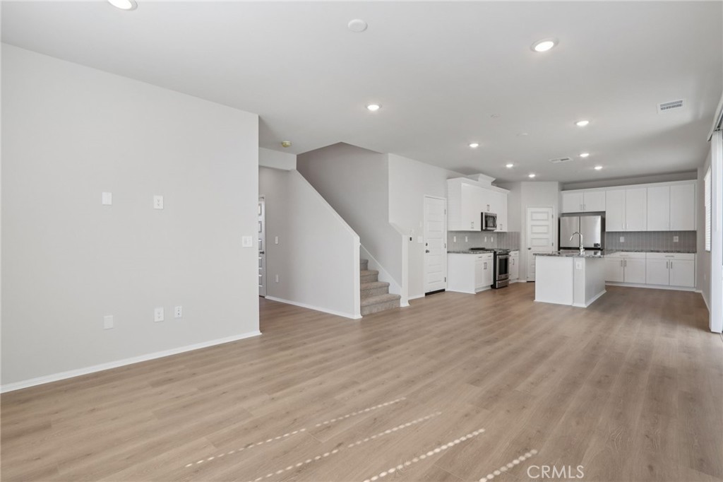 1110 Tropic Court Redlands, CA 92374 - Photo 6 of 44 a view of kitchen with wooden floor