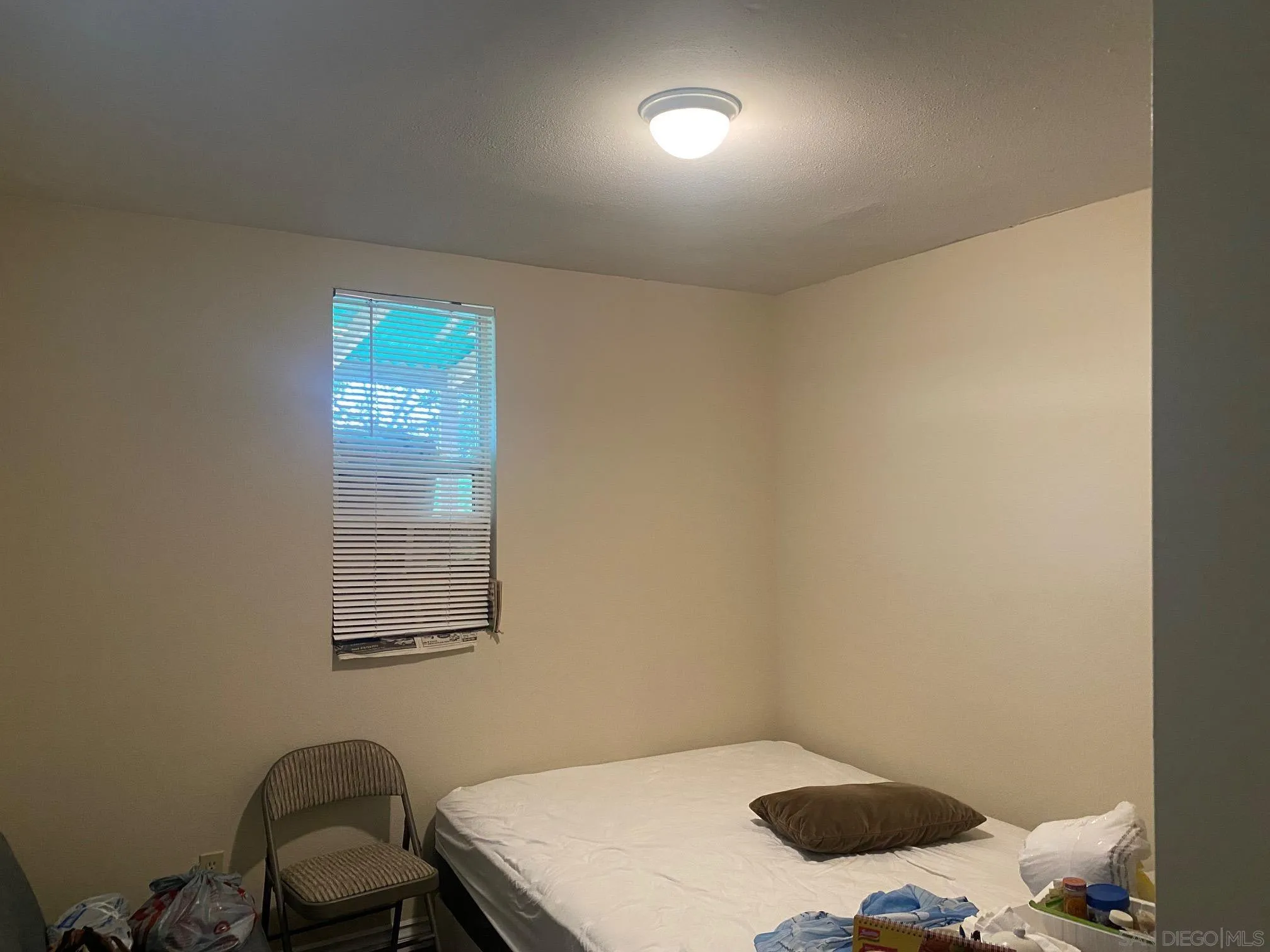 8181 Jade Coast Road San Diego, CA 92126 - Photo 7 of 9 a workspace with furniture and window