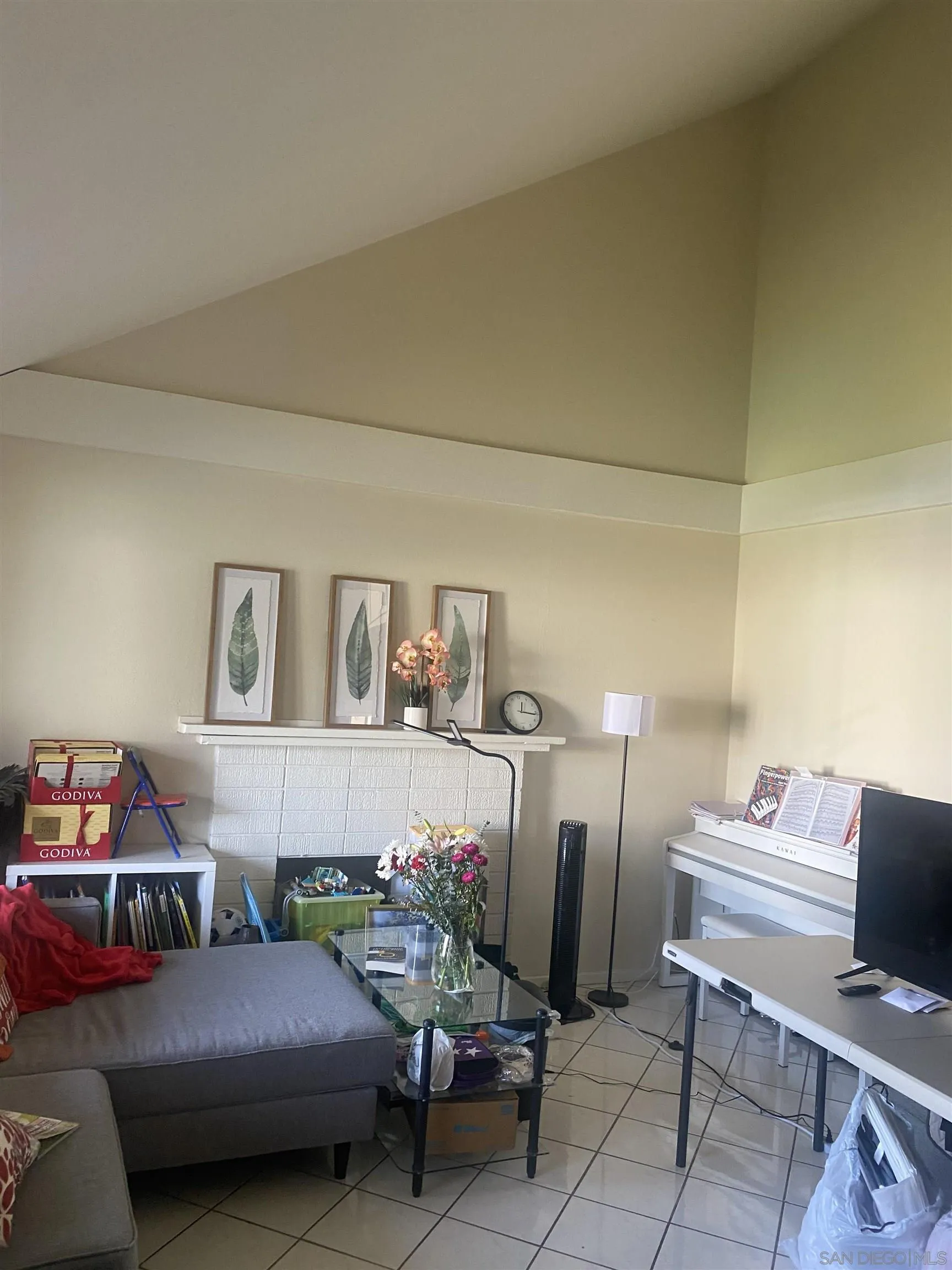 8181 Jade Coast Road San Diego, CA 92126 - Photo 10 of 10 a bedroom with furniture and a couch