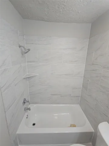 a bathroom with a bathtub