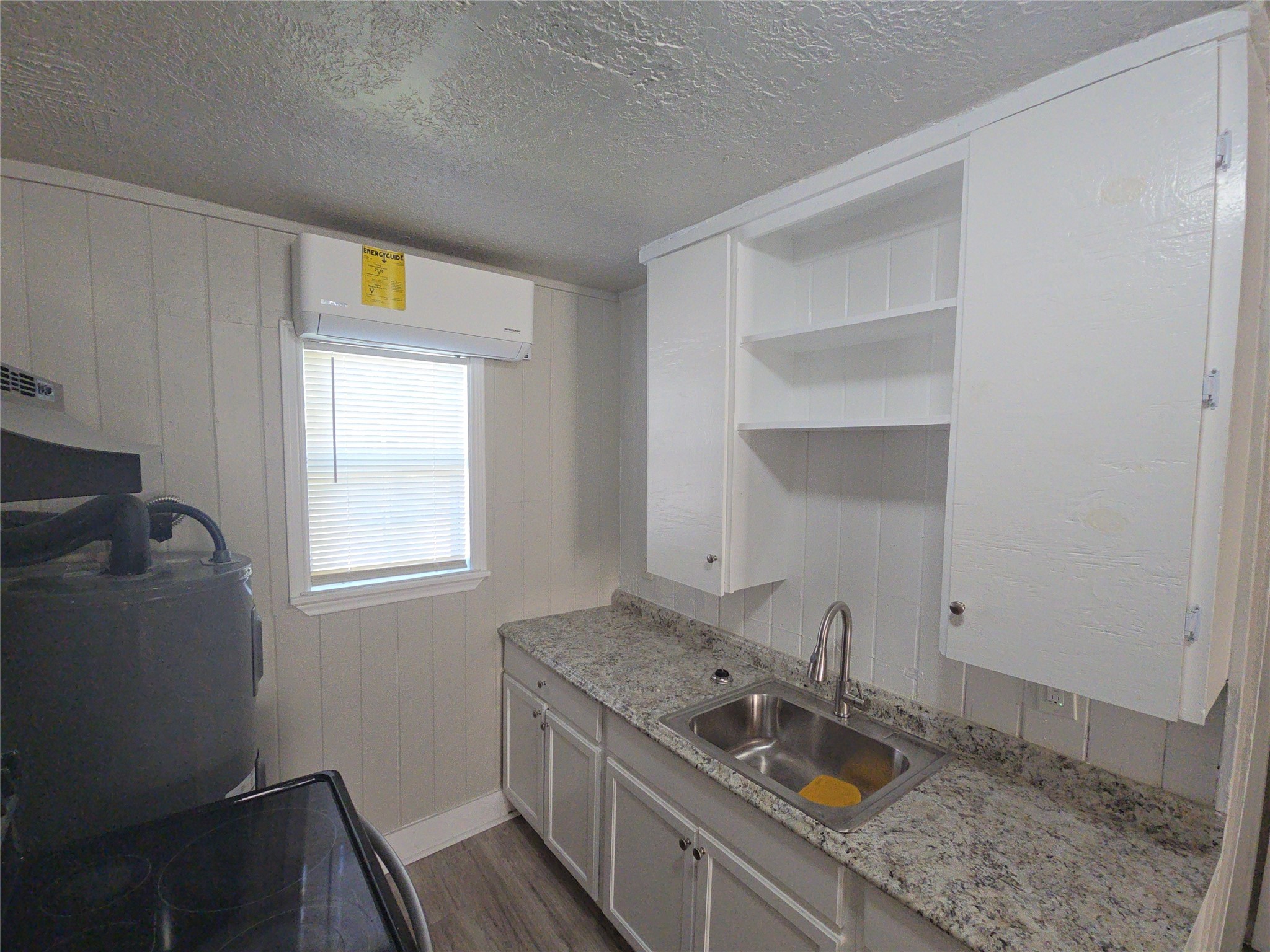 3335 Tuam Street, Unit 2 Houston, TX 77004 - Photo 2 of 15 a bathroom with a sink and a window