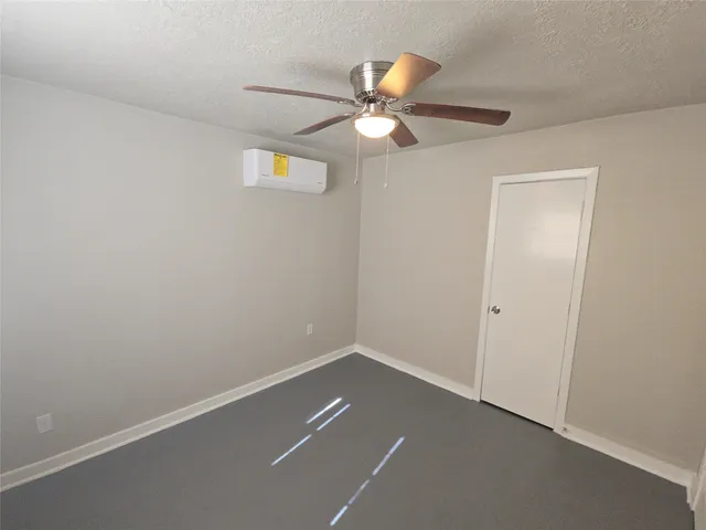 a view of a room with a fan