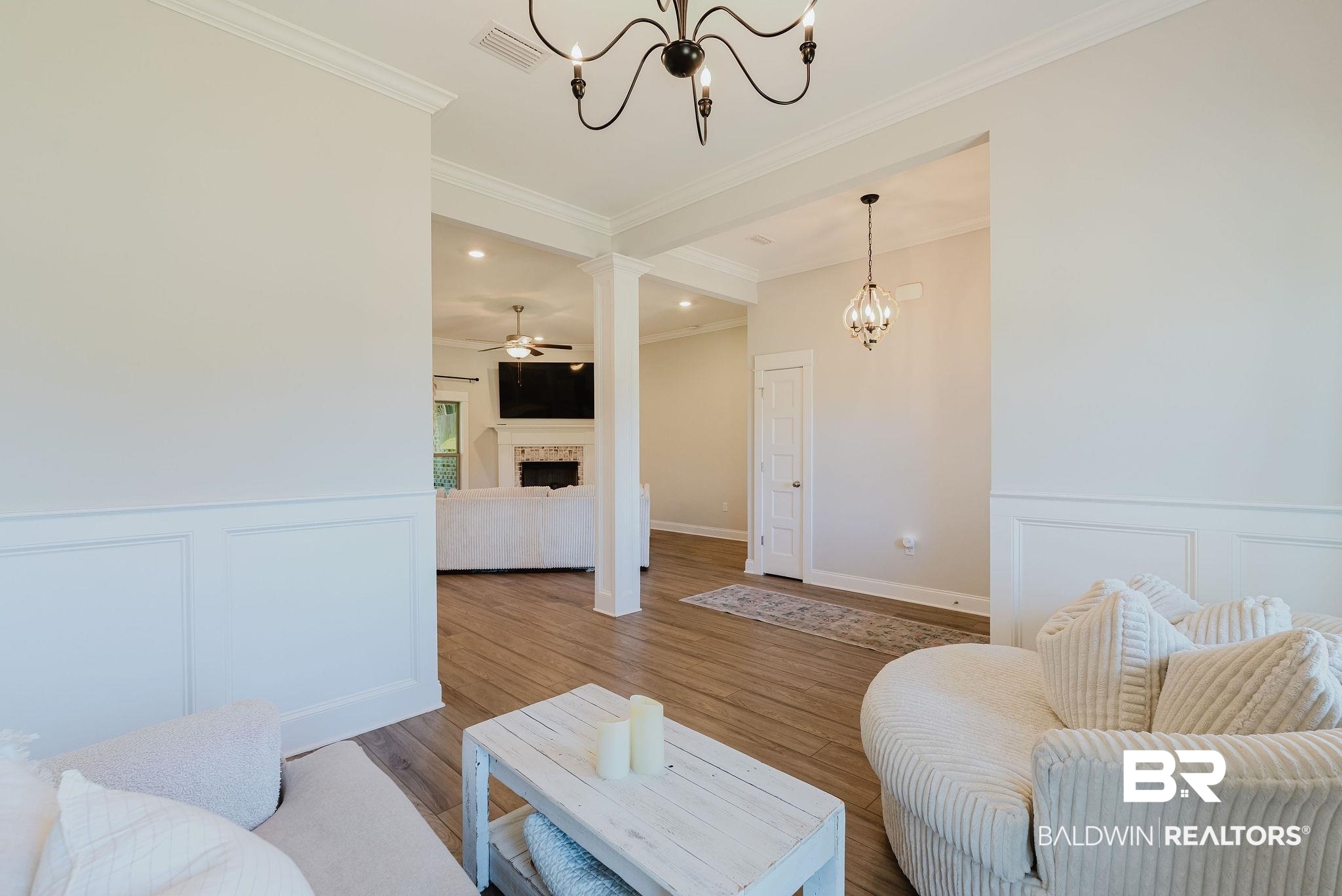 7872 Calverton Street Foley, AL 36535 - Photo 27 of 76 Interior space featuring wood-finish flooring, wainscoting, crown molding, and recessed lighting