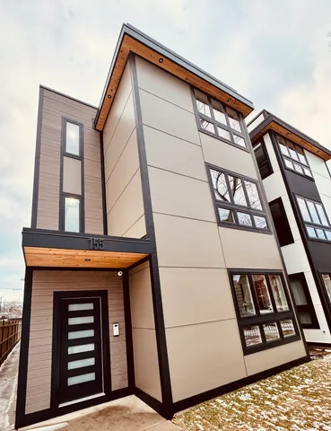 a front view of multi story residential apartment building