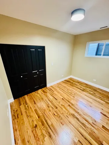 a bathroom with a sink vanity mirror and toilet